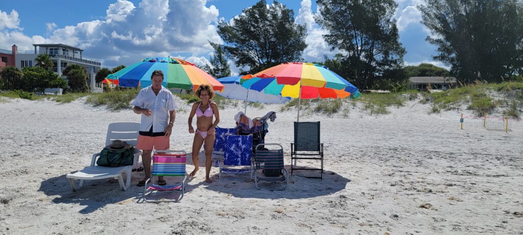 Tom and Gina by our beach setup on Indian Rocks Beach