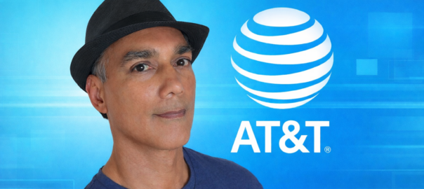 Portrait of a wireless consultant wearing a black hat in front of a blue AT&T-branded background
